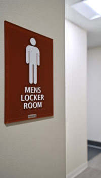 mens locker room brown sign