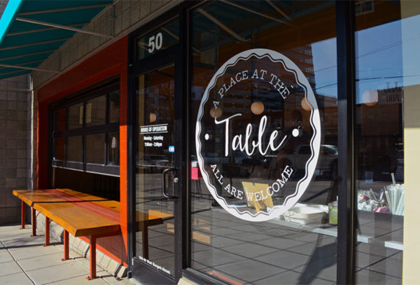 Capital Sign Solutions - A Place at the Table Featured Image